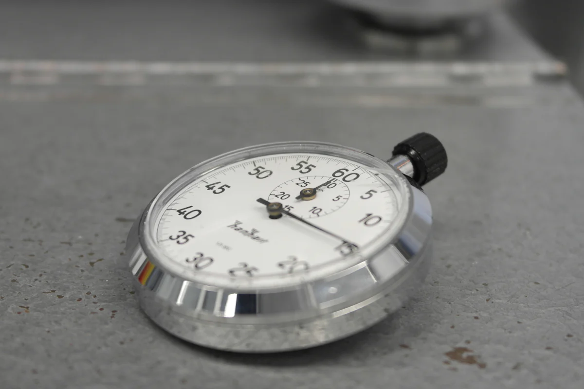 A close-up photograph of an analog stopwatch.
